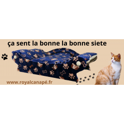 canapé pour chien et chat dans le style d'un panier de couleur bleu avec des impressions marron de pattes et d'os